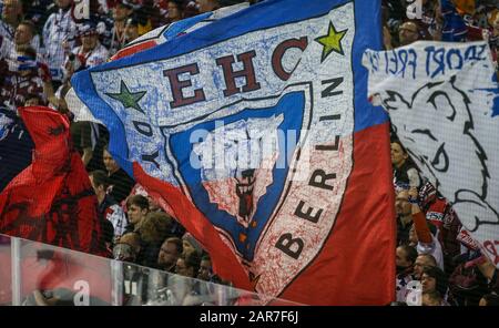 Berlin, Germany. 26th Jan, 2020. Ice hockey: DEL, Eisbären Berlin - Schwenninger Wild Wings, main round, 41st day of play, Mercedes Benz Arena. Fans of the Eisbären Berlin cheer with flags. Credit: Andreas Gora/dpa/Alamy Live News Stock Photo