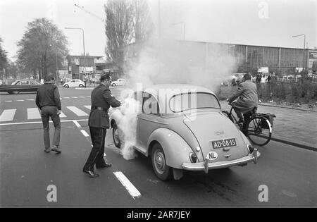 Passenger car totally burned out on corner of Apollolaan and Stadionweg Date: April 20, 1968 Keywords: cars, fires Stock Photo