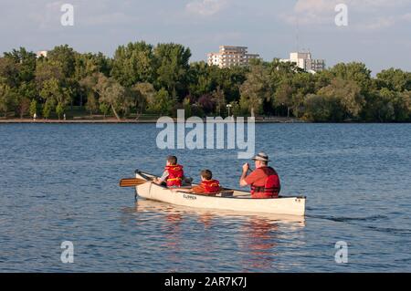 Canoeing in Wascana lake, Regina, Saskatchewan, Canada Stock Photo