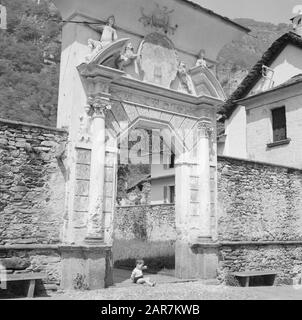 Holiday trip Switzerland - Italy  Gatehouse of a large house in the Maggia valley, one of the valleys of Tessin Date: June 1, 1964 Location: Tessino, Switzerland Keywords: villages, gates Stock Photo