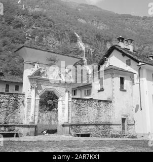 Holiday trip Switzerland - Italy  Gatehouse of a large house in the Maggia valley, one of the valleys of Tessin Date: June 1, 1964 Location: Tessino, Switzerland Keywords: villages, gates Stock Photo