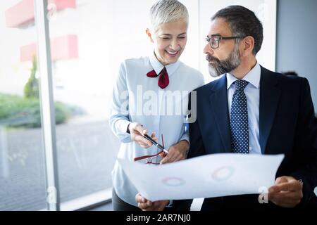 Portrait of architects having discussion in office Stock Photo