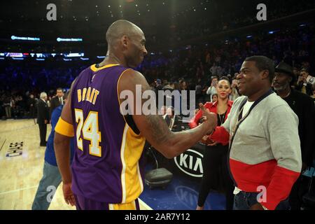 FILE: 27th Jan 2020. Lakers Star Kobe Bryant among 5 dead in helicopter crash in Southern California. photo taken: Manhattan, United States Of America. 10th Nov, 2015. NEW YORK, NY - NOVEMBER 08: (Embargoed till November 10, 2015) Magic Johnson, Tracy Morgan with wife Megan Wollover sit with Michael K. Williams and Director Spike Lee at the New York Knicks vs Los Angeles Lakers game at Madison Square Garden on November 8, 2015 in New York City. People: Tracy Morgan, Kobe Bryant Credit: Storms Media Group/Alamy Live News Stock Photo