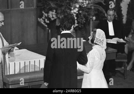 Marriage princess Christina and Jorge Guillermo; the conclusion of the church marriage in the Cathedral Church in Utrecht  Princess Christina and Jorge Guillermo during the ceremony Date: 28 June 1975 Location: Utrecht (prov.), Utrecht (city) Keywords: marriages, churches, princesses Personal name: Christina, princess, Guillermo, Jorge Institutional name: Domkerk Stock Photo