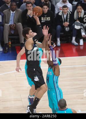 Devonte' Graham of Charlotte Hornets  and Brook Lopez of Milwaukee Bucks during the NBA Paris Game 2020 basketball match between Milwaukee Bucks and Charlotte Hornets on January 24, 2020 at AccorHotels Arena in Paris, France - Photo Laurent Lairys / DPPI Stock Photo