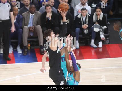 Devonte' Graham of Charlotte Hornets  and Brook Lopez of Milwaukee Bucks during the NBA Paris Game 2020 basketball match between Milwaukee Bucks and Charlotte Hornets on January 24, 2020 at AccorHotels Arena in Paris, France - Photo Laurent Lairys / DPPI Stock Photo