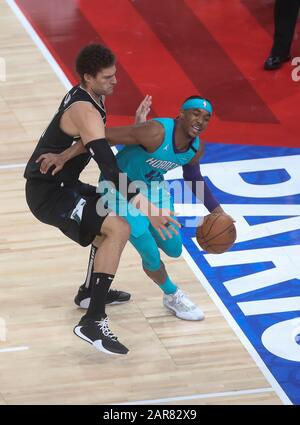 Devonte' Graham of Charlotte Hornets  and   Brook Lopez   of Milwaukee Bucks during the NBA Paris Game 2020 basketball match between Milwaukee Bucks and Charlotte Hornets on January 24, 2020 at AccorHotels Arena in Paris, France - Photo Laurent Lairys / DPPI Stock Photo
