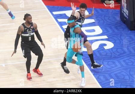 Devonte' Graham of Charlotte Hornets  and   Brook Lopez  , Wesley Matthews of Milwaukee Bucks during the NBA Paris Game 2020 basketball match between Milwaukee Bucks and Charlotte Hornets on January 24, 2020 at AccorHotels Arena in Paris, France - Photo Laurent Lairys / DPPI Stock Photo