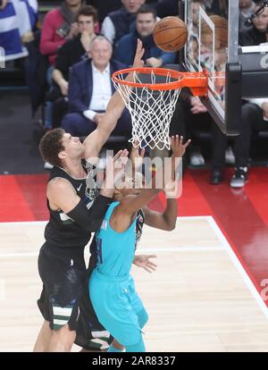 Devonte' Graham of Charlotte Hornets  and   Brook Lopez of Milwaukee Bucks during the NBA Paris Game 2020 basketball match between Milwaukee Bucks and Charlotte Hornets on January 24, 2020 at AccorHotels Arena in Paris, France - Photo Laurent Lairys / DPPI Stock Photo