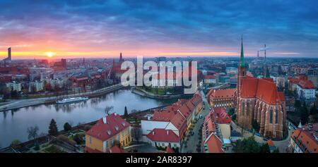 Wroclaw, Poland. Panoramic aerial cityscape of Old Town and Oder river on sunset Stock Photo
