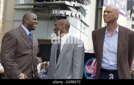 Hollywood, CALIFORNIA, USA. 30th Oct, 2006. Kobe Bryant, 41, dies in helicopter crash in Calabasas, California today Sunday 26 January 2020.Los Angeles Lakers basketball player Kobe Bryant (C) poses with former Lakers players Earvin 'Magic' Johnson (L) and Kareem Abdul-Jabbar before ceremonies honoring Lakers owner Jerry Buss with a star on the Hollywood Walk of Fame in Hollywood, California October 30, 2006.ARMANDO ARORIZO. Credit: Armando Arorizo/Prensa Internacional/ZUMA Wire/Alamy Live News Stock Photo
