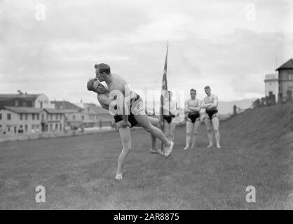 Iceland  Reykjavik. Icelandic wrestling (Glima): two members of the glimateam of the Menntaskolinn in action Date: 1934 Location: Iceland, Reykjavik Keywords: schools, sports clubs, banners, martial and defensive sports, wrestling Stock Photo