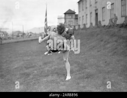 Iceland  Reykjavik. Icelandic wrestling (Glima). Two members of the glimateam of the Menntaskolinn in action Date: 1934 Location: Iceland, Reykjavik Keywords: sports clubs, martial and defensive sports, wrestling Stock Photo