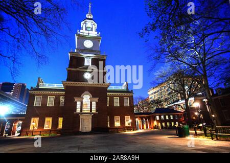 Illuminated Independence Square and Hall at night during winter in Philadelphia building where the United States Constitution was signed Stock Photo