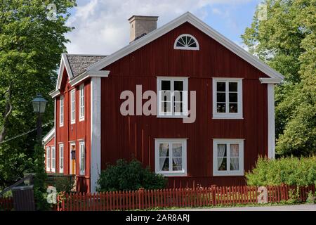 Stockholm, Sweden - August 20, 2017: Wooden house in Skansen open-air museum. The museum was opened on 11 October 1891 to show the way of life in the different parts of Sweden before the industrial era Stock Photo