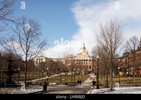 Looking across Boston Common toward the Massachusetts State Capitol from Tremont Street on a sunny winter day in Boston, MA, USA. Stock Photo