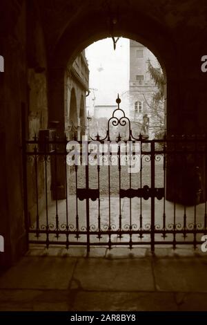 Acqui Terme, tourist walking in search of cityscape and courtyards Stock Photo