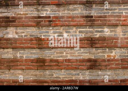 18th century terracotta bricks wall pattern Stock Photo