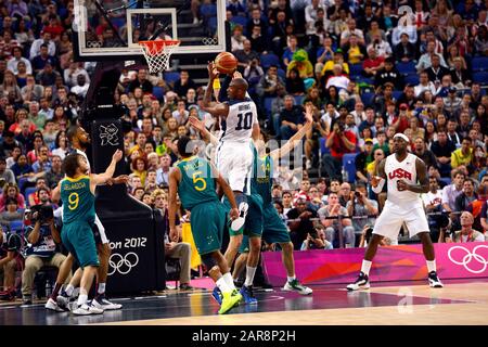 London, UK. 8 August 2012.  File photo of US Basketball star Kobe Bryant competing for Team USA against Australia during the quarterfinals of the basketball tournament at the London Olympics in 2012.  Teammate LeBron James is seen at right of frame.  Bryant along with his 13 year old daughter, Gianna was killed in a helicopter crash in Calabasas, California on Sunday, January 26, 2019 Stock Photo