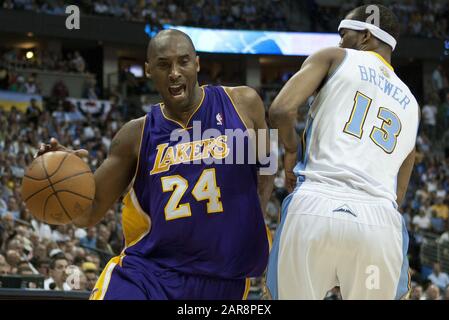 Denver, United States. 26th Jan, 2020. In this May 10, 2012 file photo Los Angeles Lakers guard Kobe Bryant draws a foul by Denver Nuggets Corey Brewer in the NBA Western Conference playoffs in Denver. Bryant was killed in a helicopter crash with his 13-year-old daughter in Calabasas, California. Photo by Gary C. Caskey/UPI Credit: UPI/Alamy Live News Stock Photo