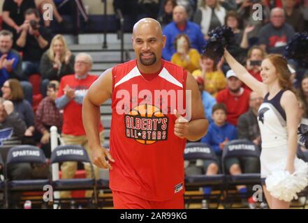 Creve Coeur, United States. 26th Jan, 2020. Los Angeles Angels Albert Pujols  is slowed by the opposing team as he plays in the Albert Pujols All Stars  basketball game at Missouri Baptist