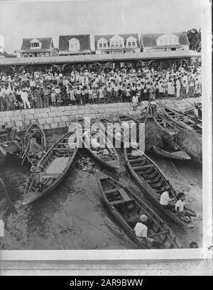 Wi [West Indies]/Anefo London series  Fishing boats in the port of Paramaribo Annotation: Repronegative Date: 1940-1945 Location: Paramaribo, Suriname Keywords: World War II, fishing boats  : Unknown/Public Domain Stock Photo