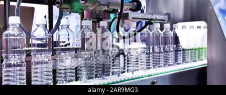 Clear plastic Bottles transfer on Automated conveyor systems industrial automation for package