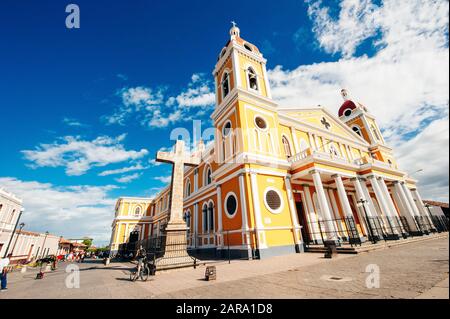 Catedral de Granada beautifully decorated in yellow, against a blue sky in Granada, Nicaragua - december, 2019 Stock Photo