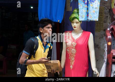 Mannequin looking at man, Lala Bazar, Almora, Uttarakhand, India, Asia Stock Photo