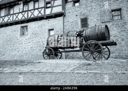 Barrels on cart, Cobbled Street, Riquewihr, Alsace, France, Europe Stock Photo