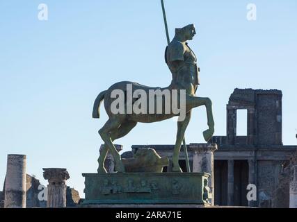 Statue of Centaur. Modern statue by Polish sculptor Igor Mitoraj on the forum of the archaeological site of the ancient Roman city of Pompeii. Stock Photo