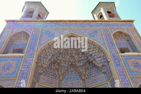 Colorful mosaic patterns and architectural details on the gate of Nasir Al-Mulk Mosque (Pink Mosque) in Shiraz, Stock Photo
