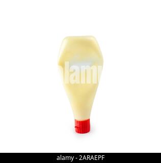 Used mayonnaise bottle on white backgrond, plastic bottle used Stock Photo