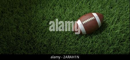 Close-up of american ball on the field - 3D Render Stock Photo