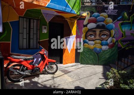 Medellin, Colombia: Comuna 13, these days the area is known for the graffiti/ street art which has helped transform this area. Stock Photo