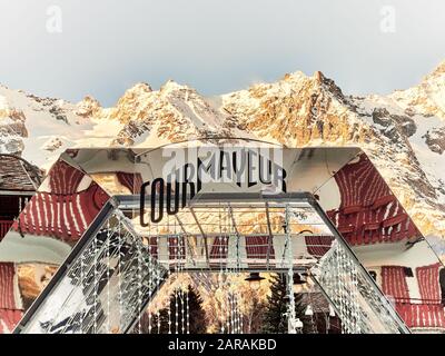 Courmayeur, Italy - January 18, 2020 Structure of mirrors in the square of Courmayeur indicating the arrival in the village with the background of the Stock Photo