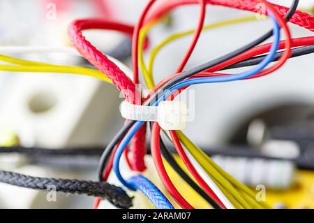 Multicolored electrical cables isolated close up. Selective focus. Stock Photo