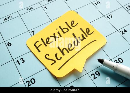 Flexible schedule handwritten memo on the calendar. Stock Photo