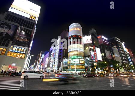 TOKYO, JAPAN - MAY 8, 2012: Shoppers visit Ginza district in Tokyo. Ginza is recognized as one of the most luxurious shopping districts in the world, Stock Photo