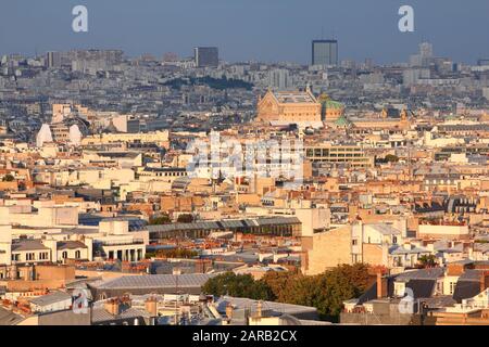 Paris city sunset view with 8th Arrondissement and Opera Garnier in background. Stock Photo
