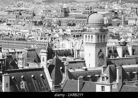 Paris, France - aerial city view. UNESCO World Heritage Site. Black and white toned photo.