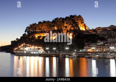 Viewed here and set in the Ionian Sea lies the beautiful Greek Town of Parga lies the Venetian Castle of Parga. Stock Photo