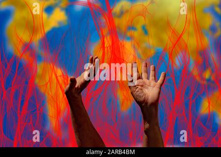 flames Save the planet raised hands on fire and earth world background Stock Photo