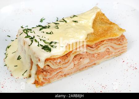 Lasagna-traditional Italian casserole made from layers of dough and minced meat, Bolognese and prima sauce, Parmesan cheese. Stock Photo