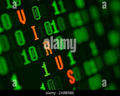 Virus found in binary data on computer screen Stock Photo