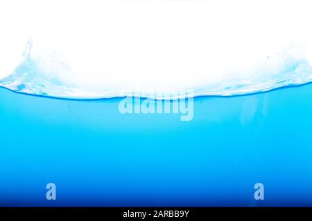 Level water and air bubbles over white background Stock Photo