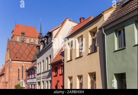 Houses and church in the historic center of Gustrow, Germany Stock Photo