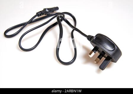 Power Cable UK Mains Fused Plug on white background Stock Photo
