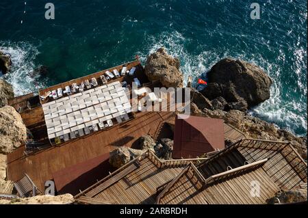 Oz Hotels in Antalya, Turkey - Seaside resort sun terrace built into the cliffs on the Mediterranean coast Stock Photo