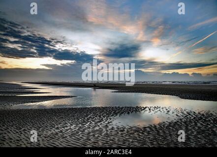 Camber Sands sunrise, Sussex, England. Stock Photo